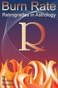 Astrology book cover with flames and letter.