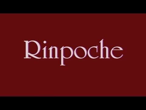 Rinpoche text on dark red background.