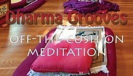 Meditation cushions on wooden floor.