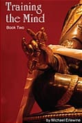 Golden statue hand on red book cover