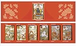 Tarot cards fanned on red patterned cloth