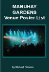 Concert audience silhouetted against blue stage lights