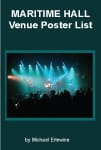 Live show silhouetted by turquoise beams