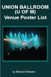 Crowd at concert under blue-green stage lights