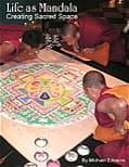 People assembling colorful sand mandala
